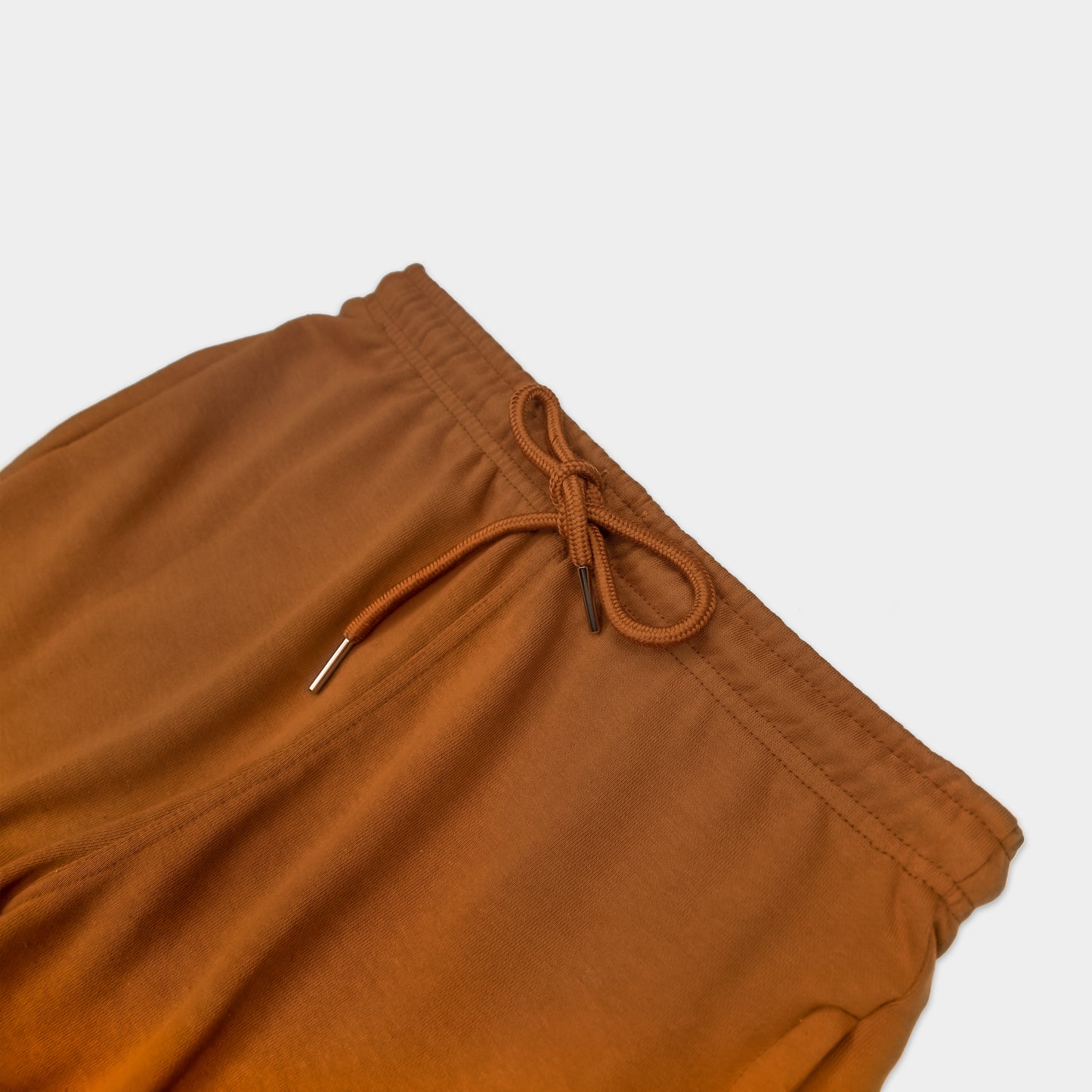 SADDLE SOLID SWEAT SHORTS WITH TAN TERK EMBROIDERED LOGO